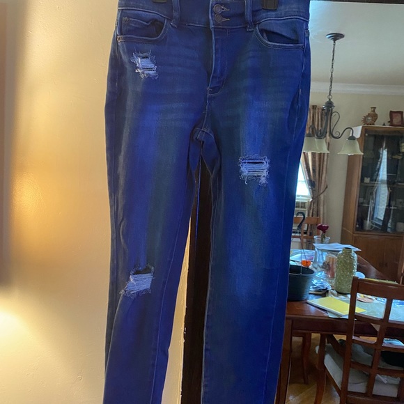 dark blue jeans with rips. - Picture 1 of 3
